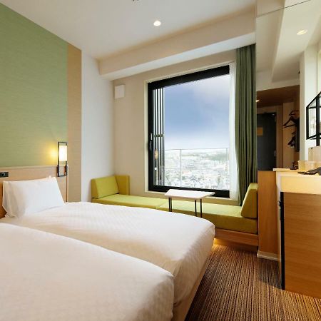 Candeo Hotels Osaka Kishibe Suita Bagian luar foto