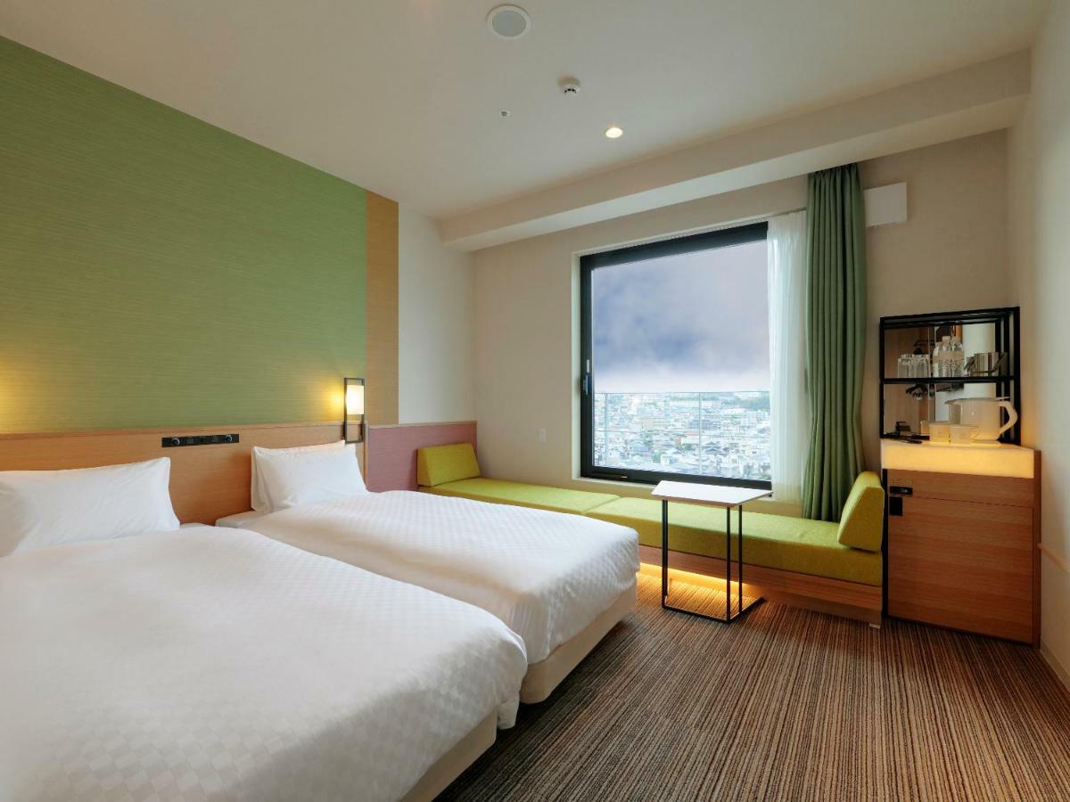 Candeo Hotels Osaka Kishibe Suita Bagian luar foto