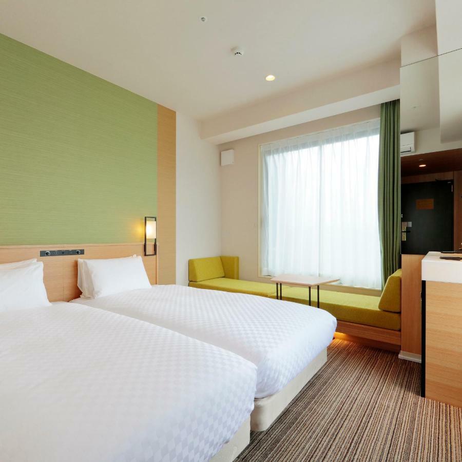 Candeo Hotels Osaka Kishibe Suita Bagian luar foto